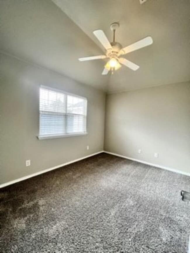 Building Photo - Spacious 3-Bed, 2.5-Bath Fourplex with Gar...