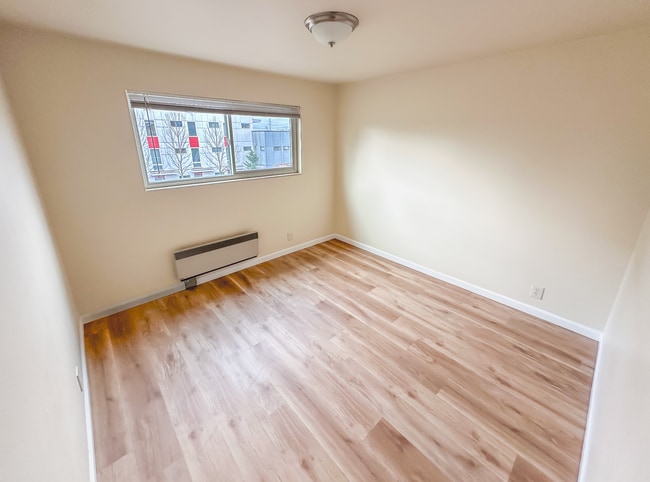 Building Photo - Charming Triplex with Hardwood Floors, Appliances, and Utilities Included in Prime Ballard-Fremon...