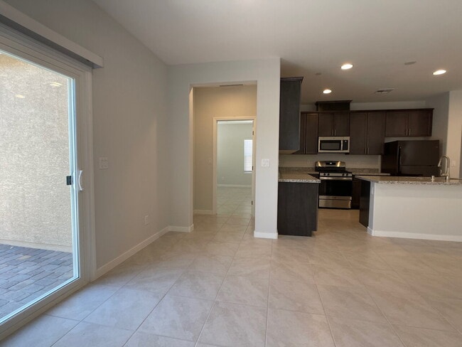 Building Photo - 4 BED 2 BATH 2 CAR GARAGE SINGLE STORY SINGLE FAMILY HOME w/ PAVED BACKYARD IN CADENCE COMMUNITY,...