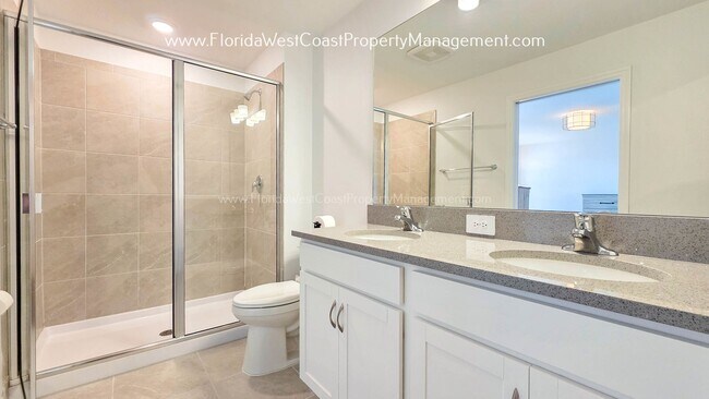 Building Photo - EXCEPTIONAL AND SPACIOUS FURNISHED TOWNHOME WITHIN WATERSIDE- NAUTIQUE!