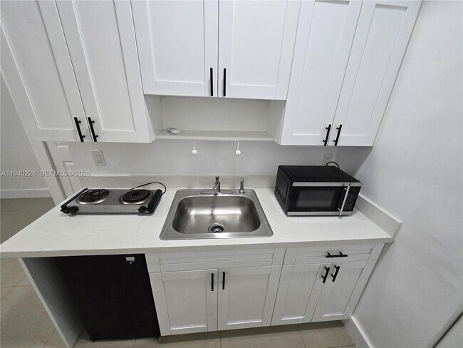 Building Photo - 931 Opa-locka Blvd