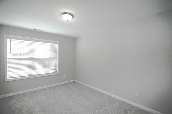 Building Photo - 648 Lansing Grove Way