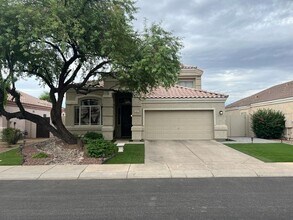 Building Photo - BEAUTIFUL executive style home w/ entertainer's dream backyard!