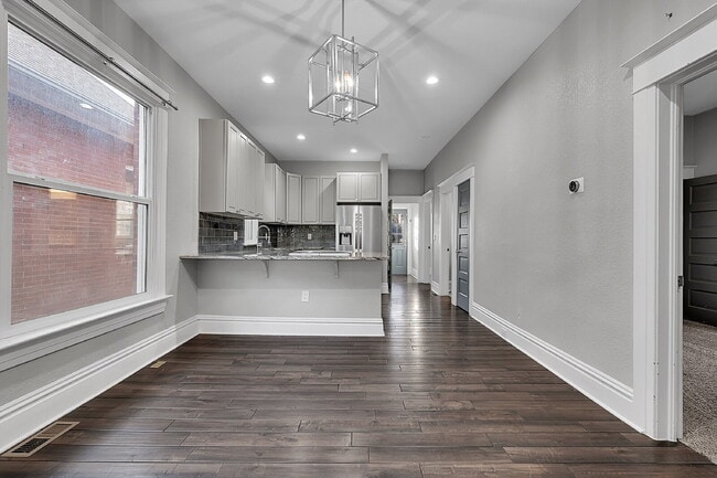 Building Photo - $3,240.95, $300 off the first month's rent, 4 Beds - 2 Bath, Single Family Home in Denver with Wa...