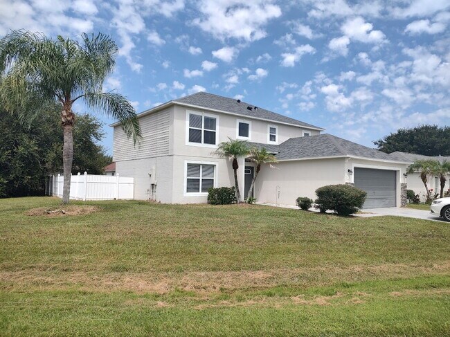 Building Photo - Spacious 4 bedroom, 2.5 bathroom house in Poinciana