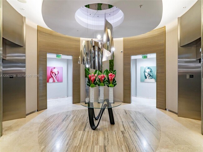 Building Photo - 10275 Collins Ave