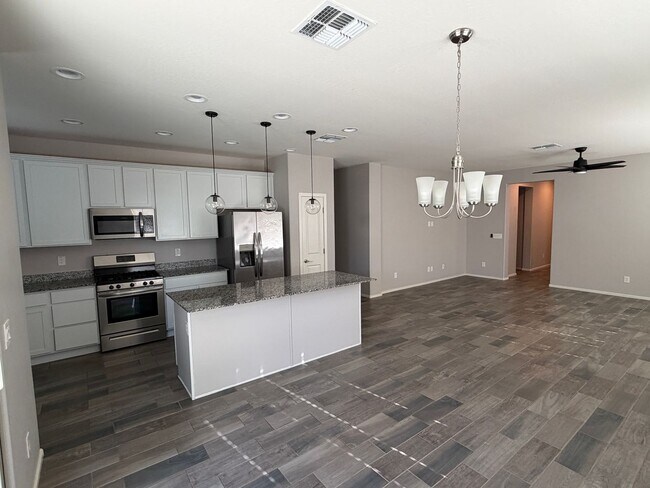 Building Photo - Three Bedroom Two Bath Home with A Den