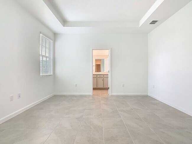 Building Photo - New Luxury Townhome in Celebration with All porcelain tiled floors. Island Village new construction