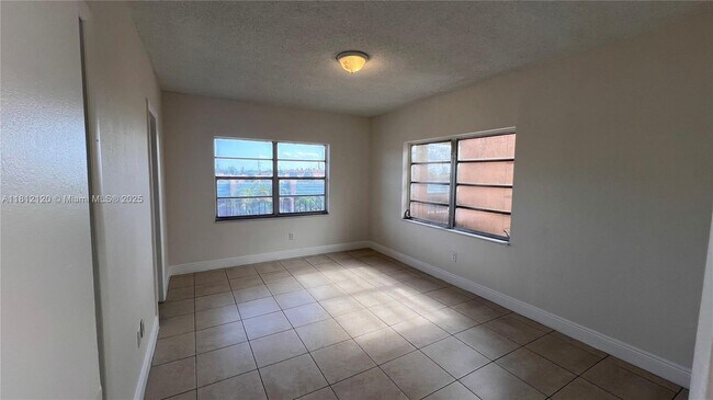 Building Photo - 3675 W 11th Ave