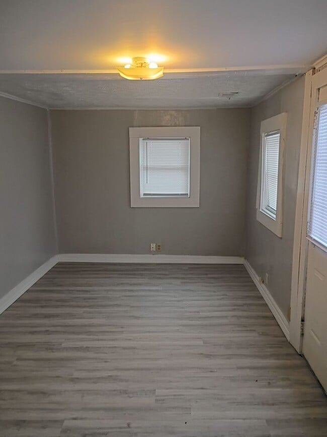 Building Photo - UPDATED HOME!  Front Deck with Large Front Yard!