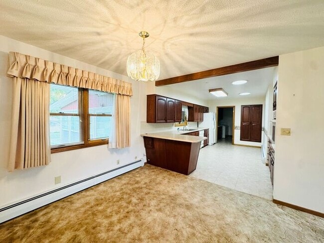 Building Photo - 4 Bedroom - 2 Bath Ranch Style Home with 2...