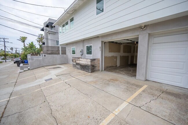 Building Photo - Bright 2BR with Private Balcony, In-Unit Laundry & Attached Garage in the Heart of La Jolla