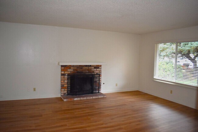 Building Photo - 4-bedroom home with luxury vinyl flooring and much more!