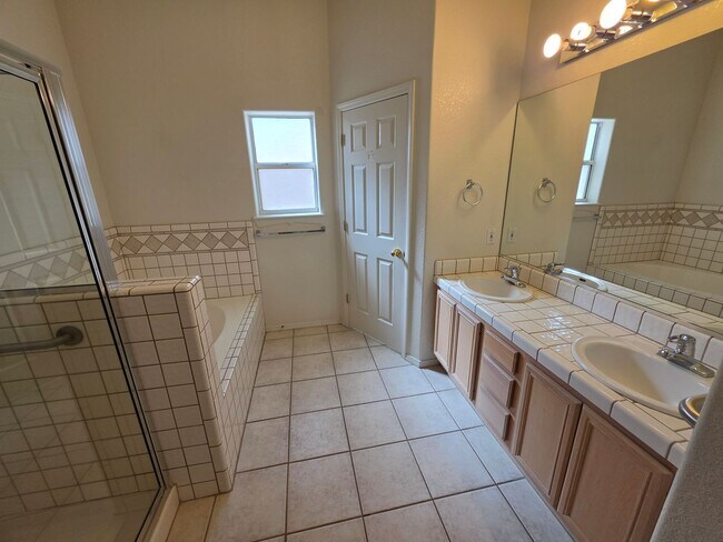 Building Photo - Spacious 3-Bedroom Home with RV Parking & 3-Car Garage in Bullhead City