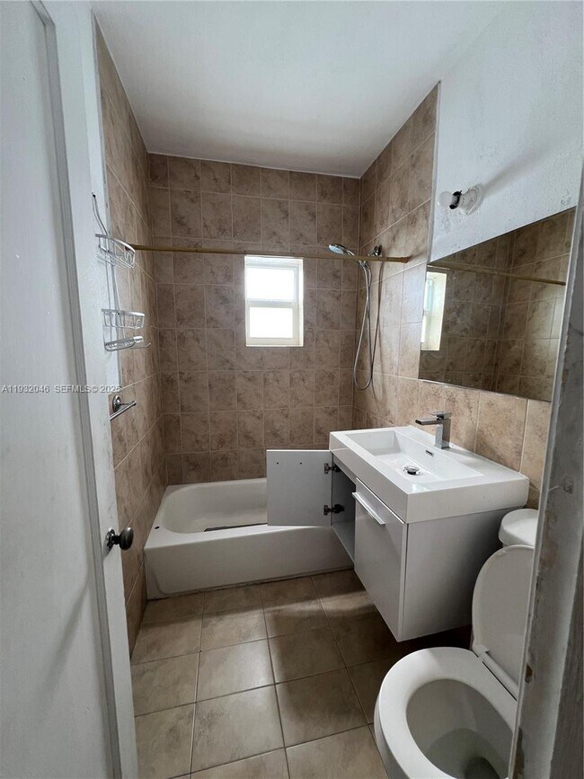 Building Photo - 7920 Harding Ave