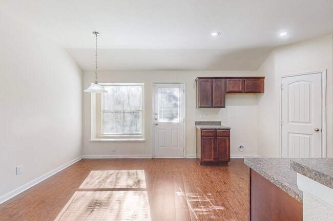 Building Photo - Spacious and Welcoming 4-Bedroom Home with...