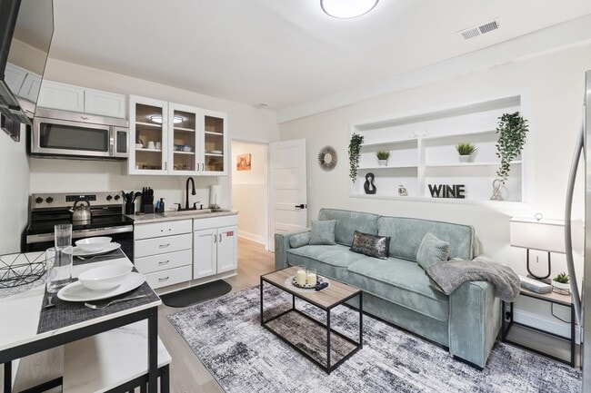 Building Photo - Fully Furnished: Beautiful 4-Bedroom Home ...