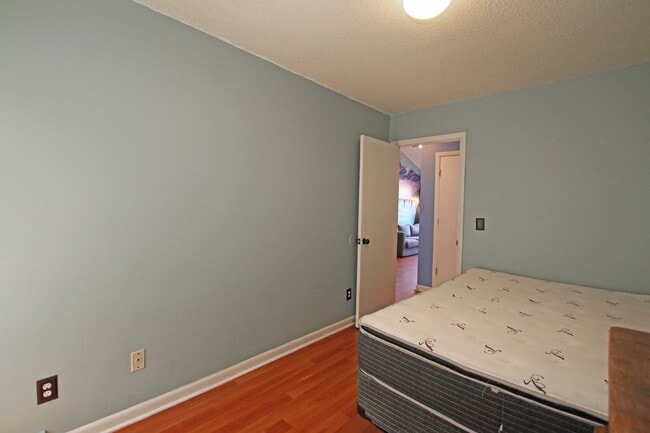 Building Photo - "Rent a room in this 4-Bedroom Furnished T...