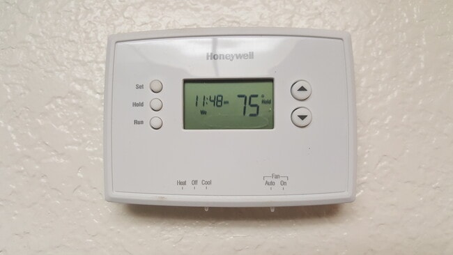 Programmable thermostat - 4545 N 67th Ave