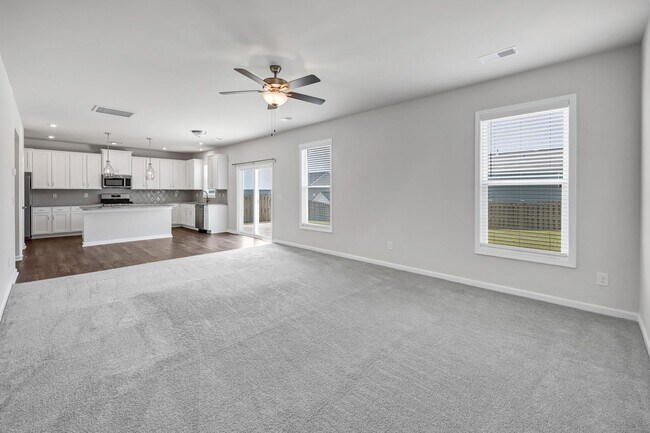Building Photo - Sophisticated Like-New 4-Bedroom Home with Designer Finishes & Fenced Backyard!