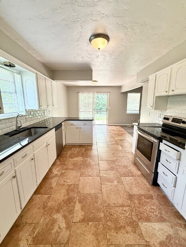 Building Photo - Charming  4-Bedroom Home in the Village!