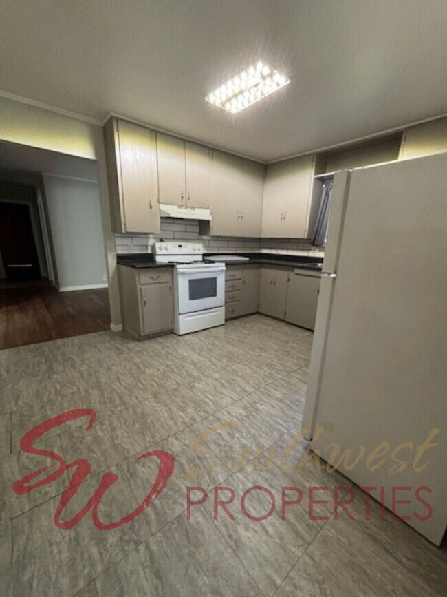 Building Photo - Spacious 4 Bedroom Home with Park-Like Backyard!