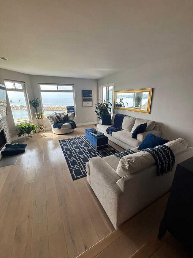 Building Photo - Enjoy unforgettable sunsets, fresh ocean air, and coastal living at its absolute best.