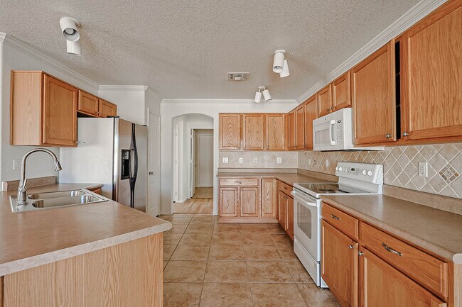 Building Photo - 3225 N 130th Ave