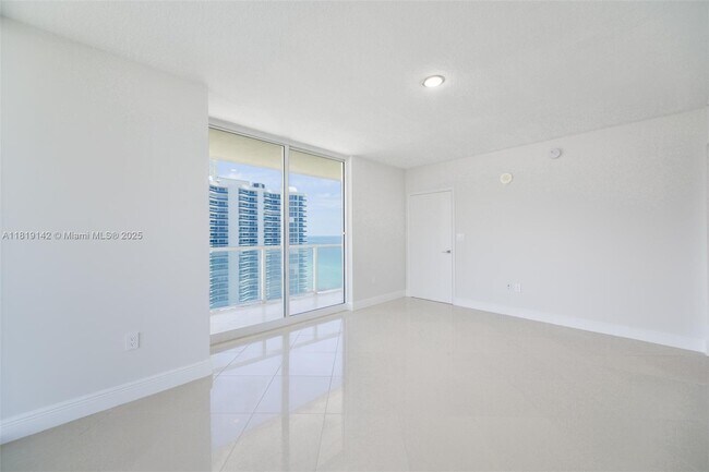 Building Photo - 16699 Collins Ave