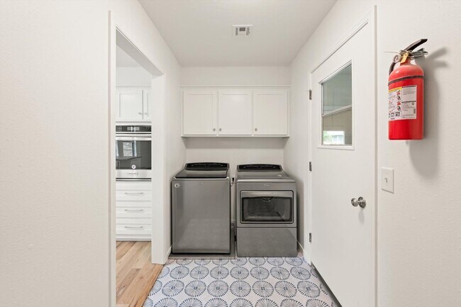 Building Photo - Modern Details and Interiors to a sought-a...