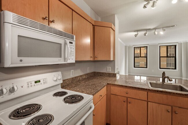 Building Photo - $400 Off! Professionally Managed, Spacious...