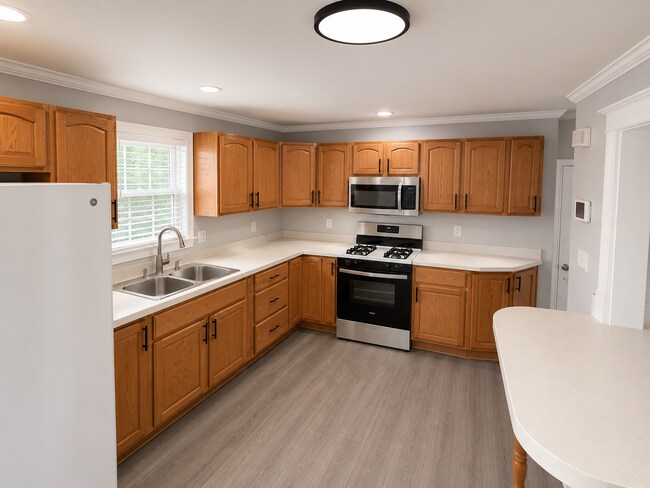 Building Photo - Renovated 2 Bed + Finished Basement | 1.5 Bath | Half Off Deposit | All Housing Vouchers Welcome!
