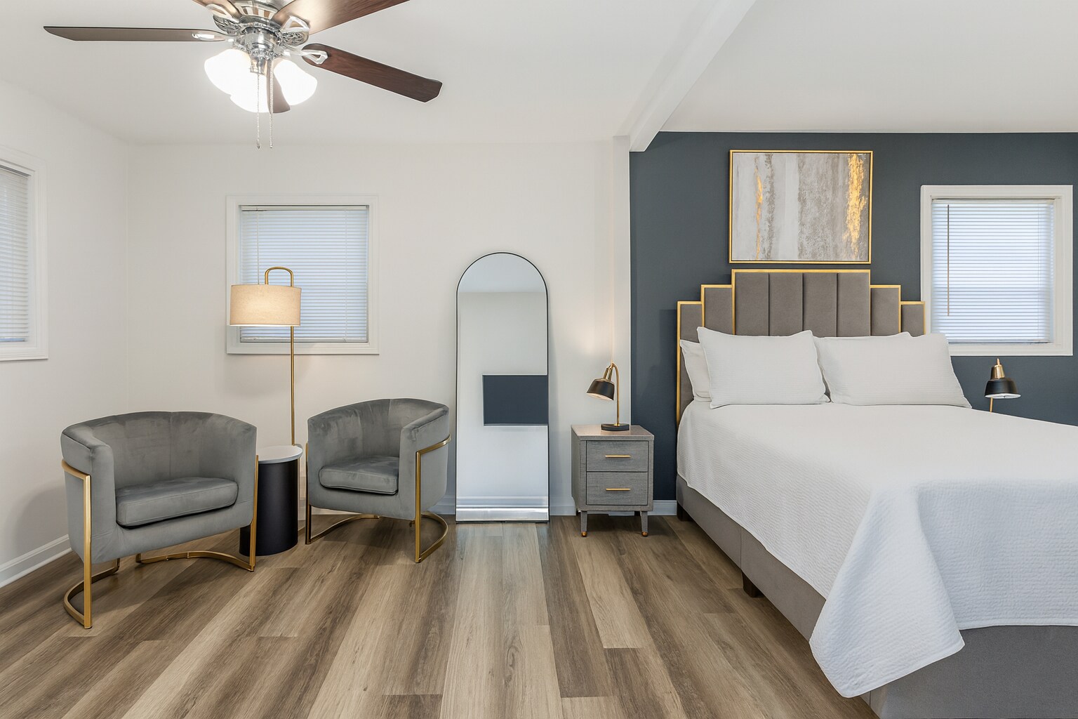 A large primary suite with a relaxing sitting area, two custom closets, and private access to the ou - 2394 Bouldercliff Way SE