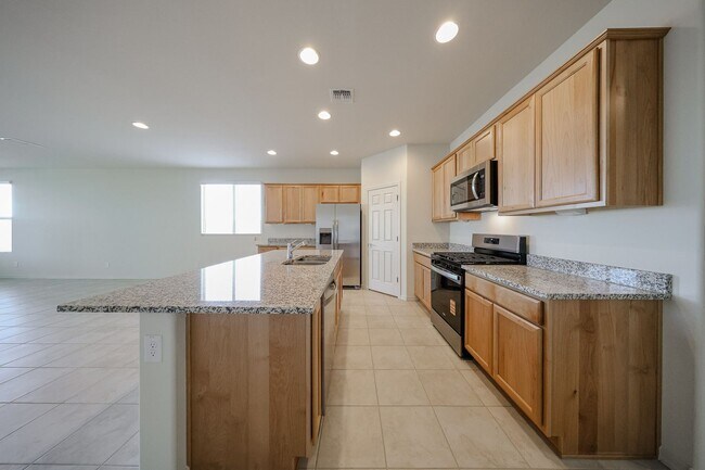 Building Photo - New 4 Bedroom + Den Home in Asante Community