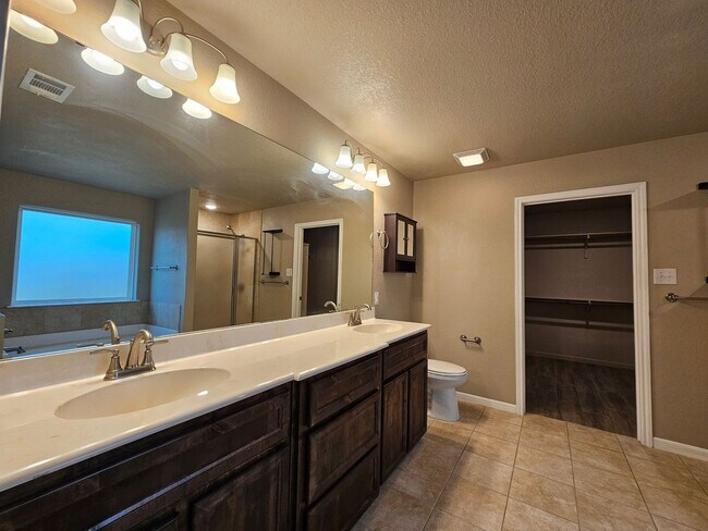 Building Photo - RENT REDUCTION - AVAILABLE NOW!