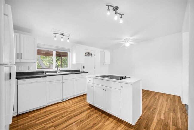 Building Photo - Spacious 4-Bedroom Layton Home with Finished Basement and 2-Car Garage
