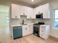 Building Photo - Lowered Price! FULLY Remodeled. BRIGHT! In-Unit W/D, Stainless Appliance Package, MODERN!