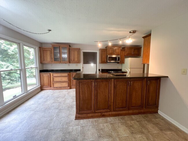 Building Photo - Gorgeous Single-Family Home! Large Deck, B...