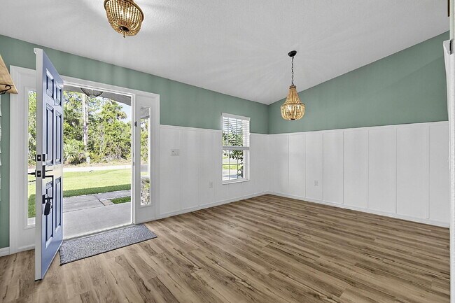 Building Photo - Modern 4-Bedroom, 3-Bath Home with Private In-Law Suite – Palm Coast, FL