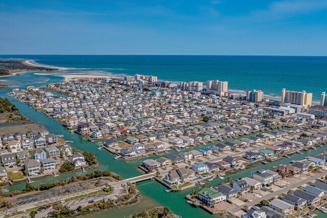 Building Photo - Coastal Living at its Best: Charming 3-Bedroom Near the Beach