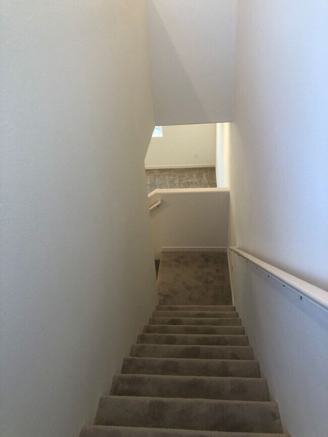 Building Photo - CORNER LOT - END UNIT - NO YARD TO MAINTAIN - GRANITE - STAINLESS - GATED