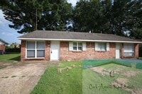 Building Photo - This 2 bedroom 1 bath apartment - includes refrigerator, stove and dishwasher.