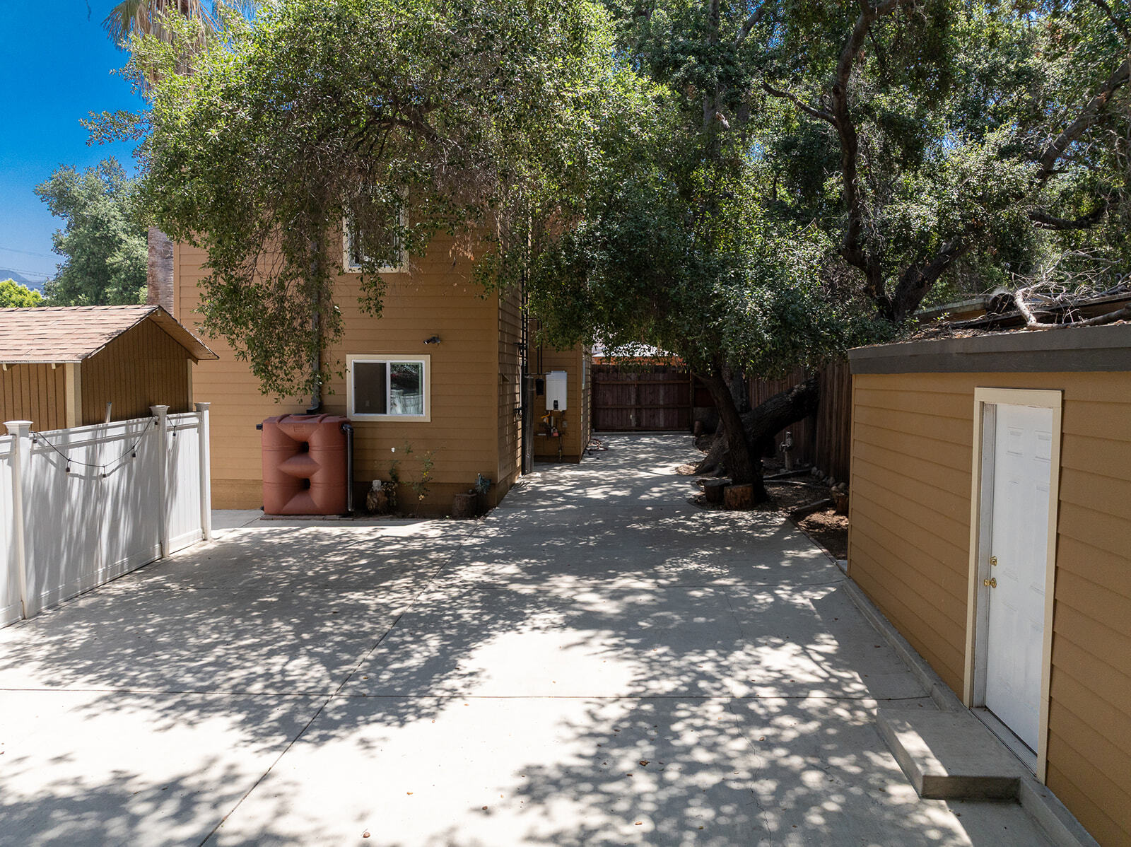 Backyard with storage shed to the right - 8424 Grenoble St