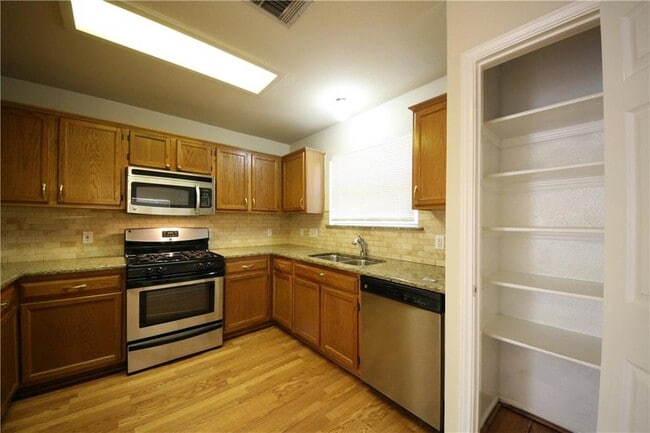 Building Photo - 7608 Tovar Dr