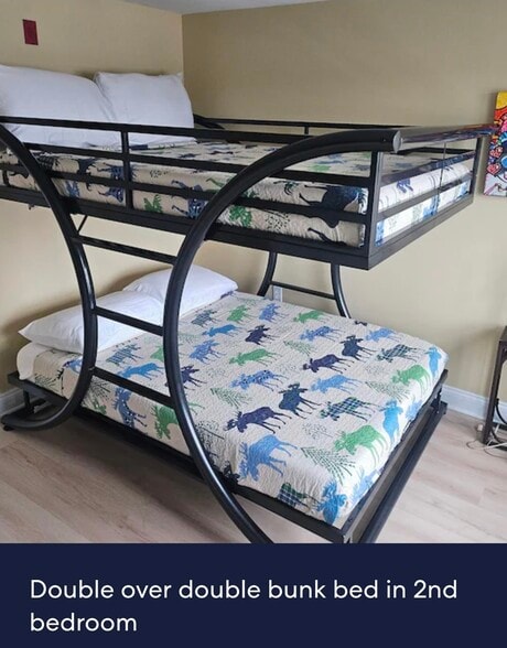 Second bedroom with full over full bunk bed - 1 E Grand Ave
