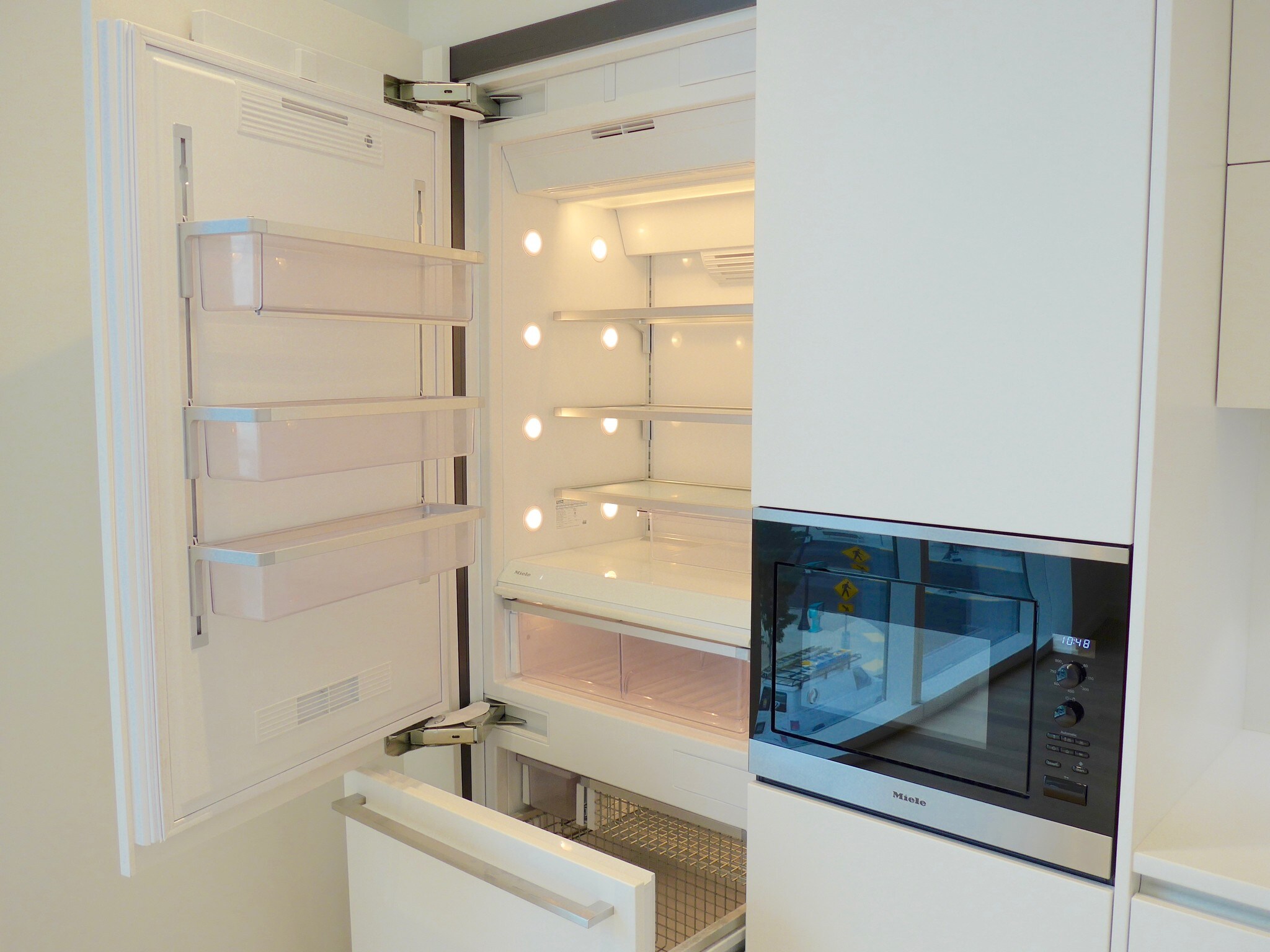 Miele fridge and microwave - 1275 NW 10th Ave