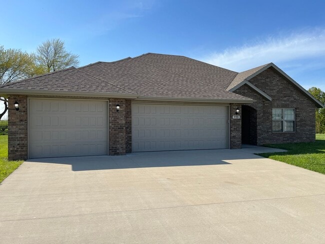 Primary Photo - 4 bedroom, 2 bathroom, and a 3 car garage ...