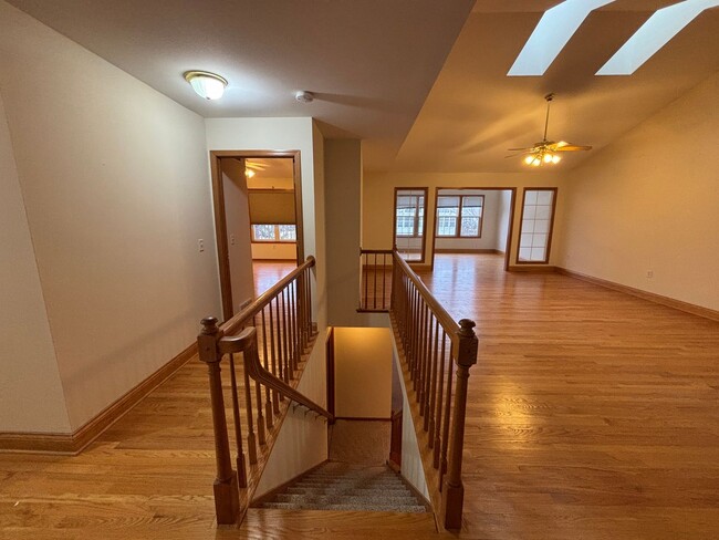 Building Photo - Spacious 3BR/3BA Condo with Finished Basement + 2-Car Garage — Available Now