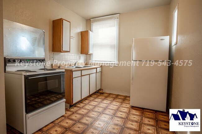 Building Photo - Ground Level, One Bedroom Apartment with A...