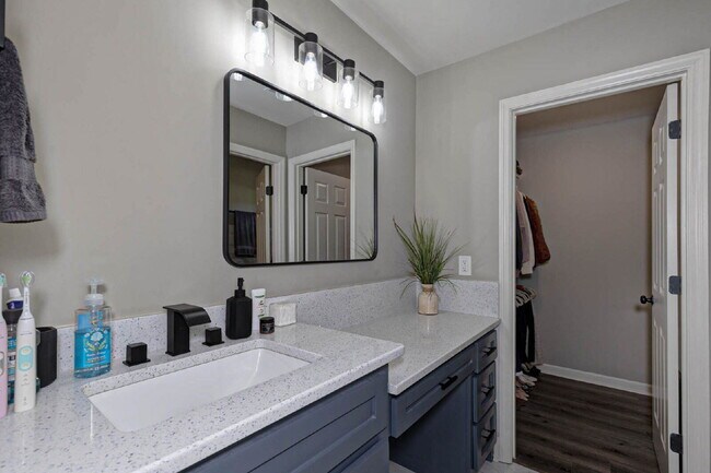 Building Photo - COMING SOON · Designer Renovation · Covered Deck Pavilion · 2-Car Garage · Lawn Care Included